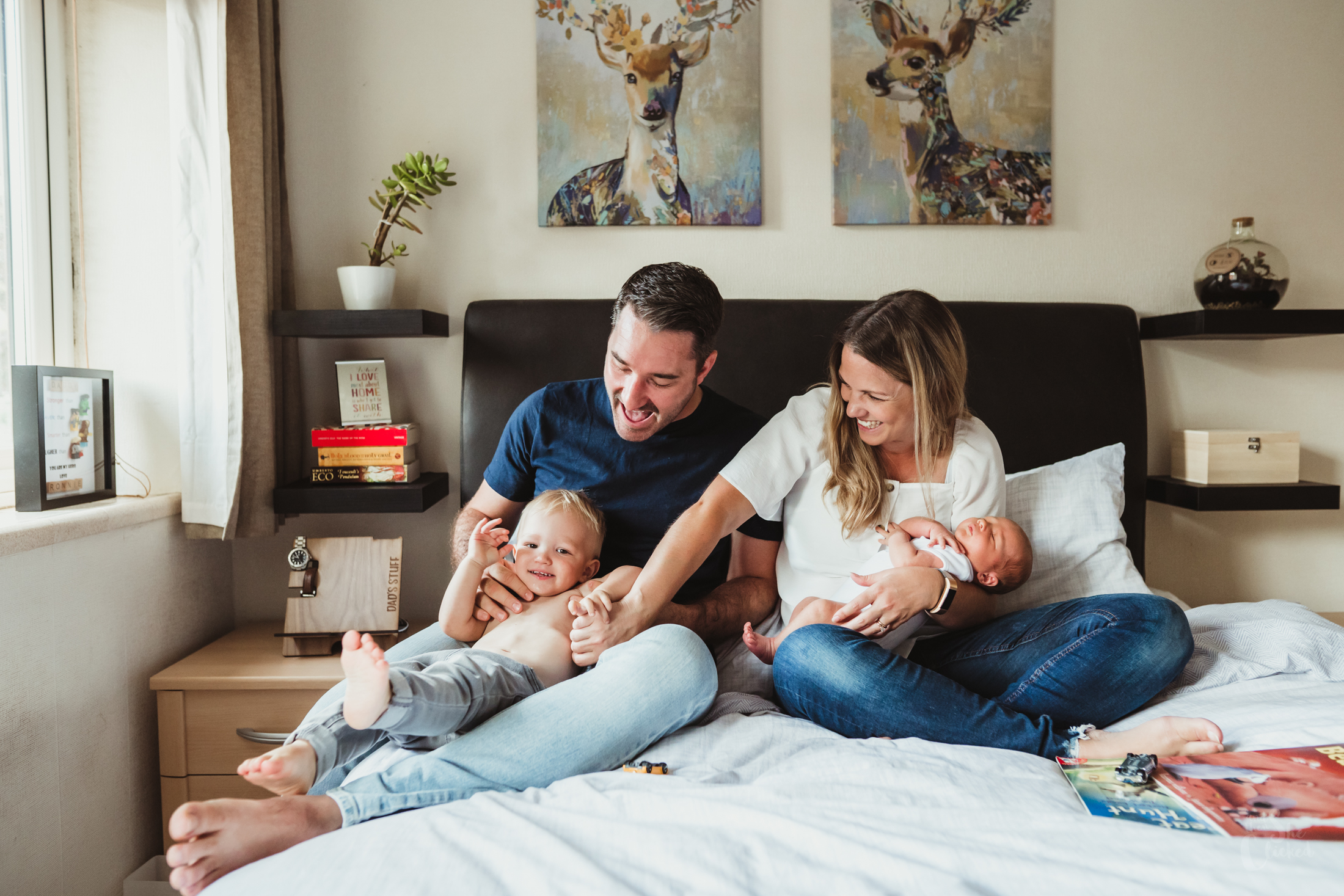 family with a newborn photoshoot at home