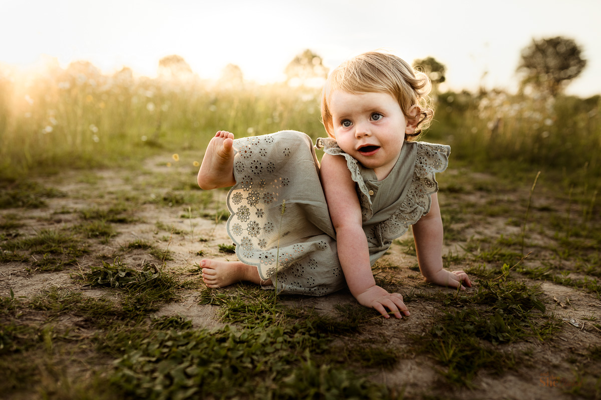 Childrens photographer in the daisy field Bracknell and then she clicked