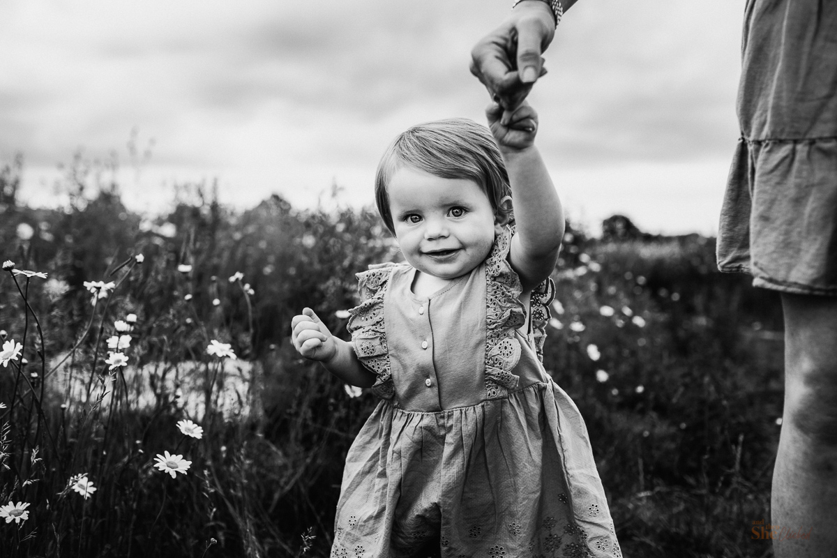 Childrens photographer in the daisy field Bracknell and then she clicked