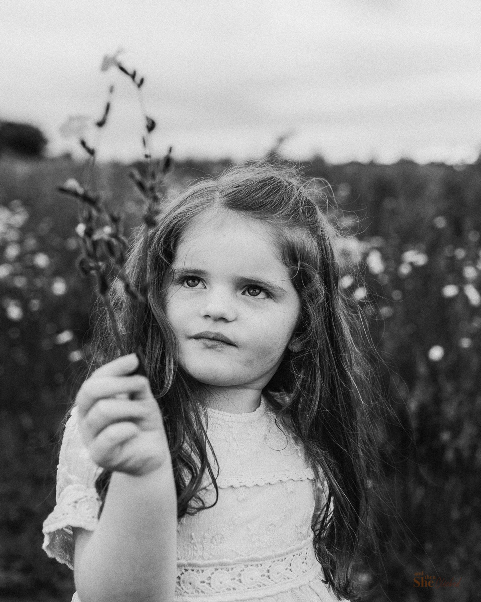 Childrens photographer in the daisy field Bracknell and then she clicked
