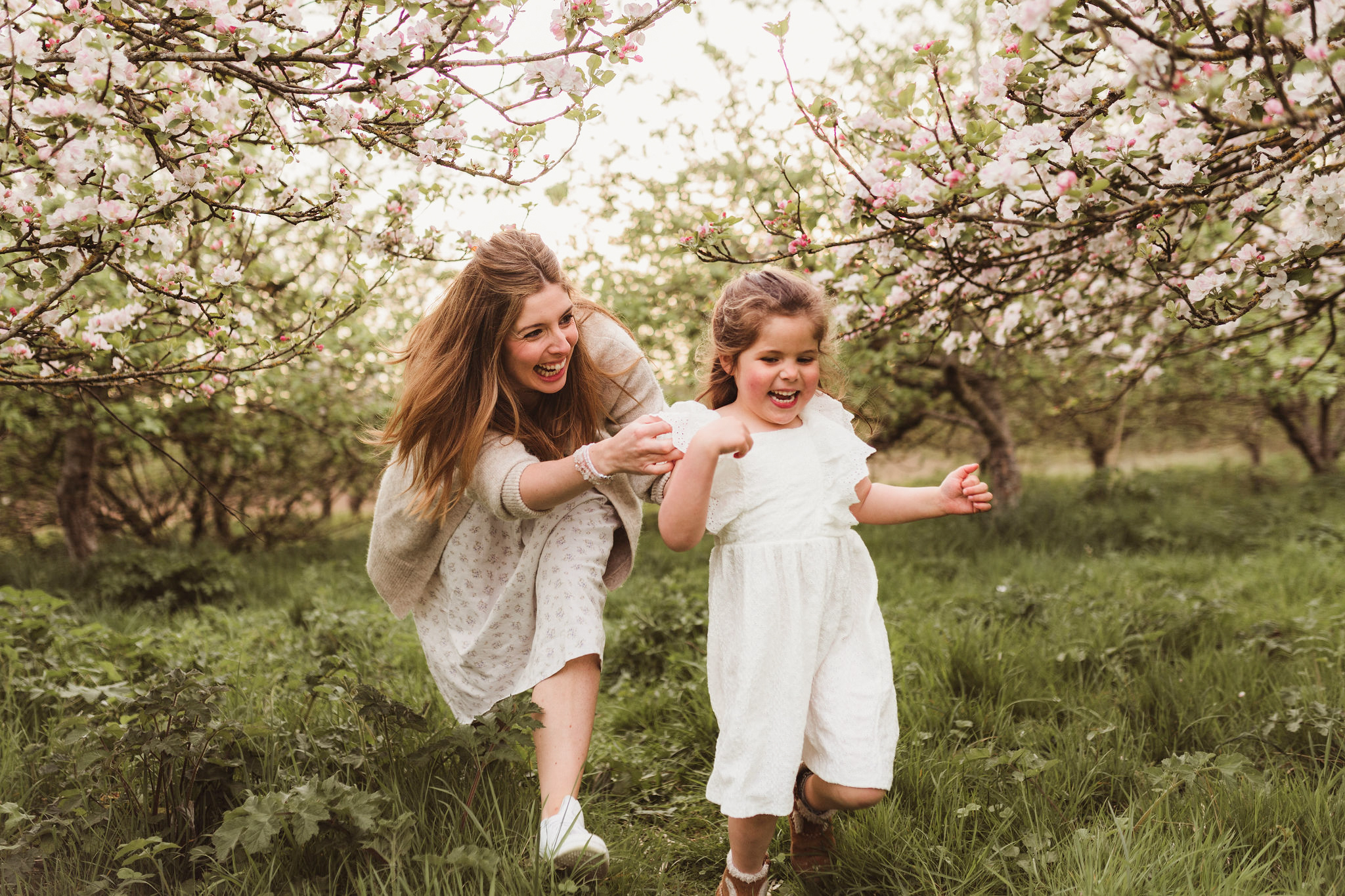 running through the blossom with kids