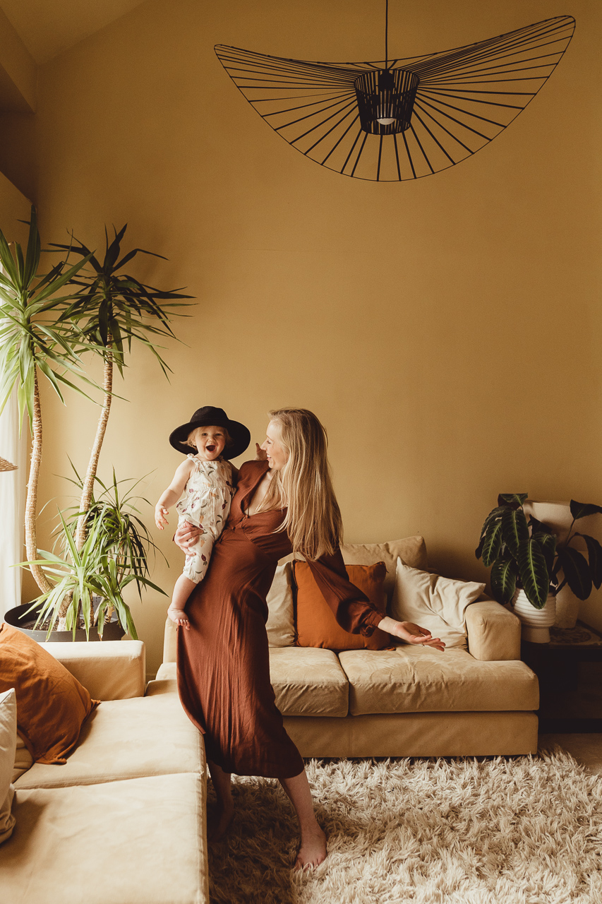 indoor natural boho studio lounge photoshoot mothehood with hat